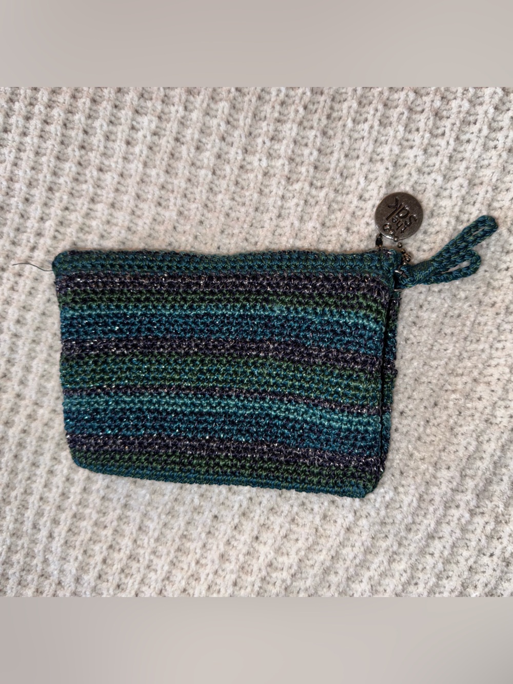 The Sak striped turquoise crochet boho-style Women’s Wallet